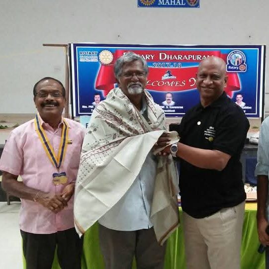 Dr. Dhanaraj honoured with a shawl by Rotary Dharapuram